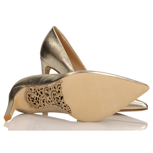 Gold coloured heels a decorative bottom