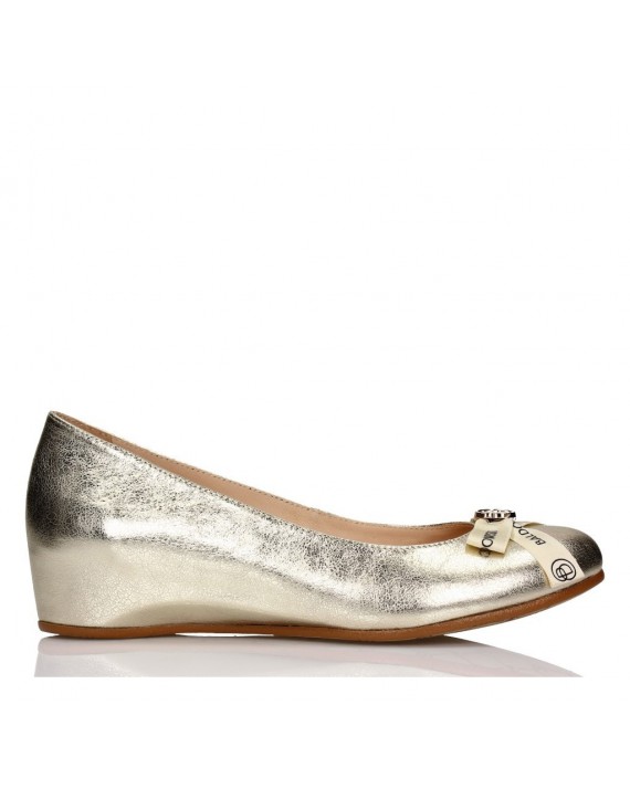 Gold coloured flat shoes
